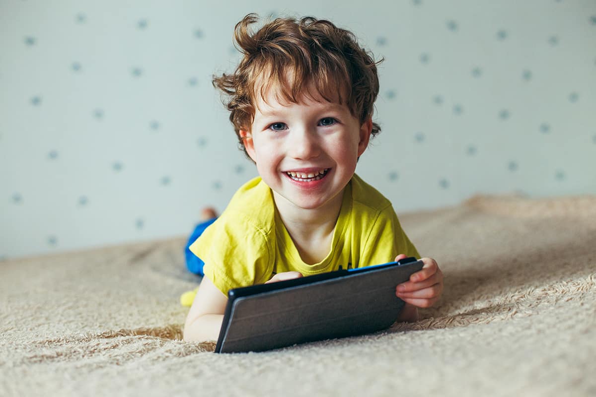 a young boy attending online aba therapy